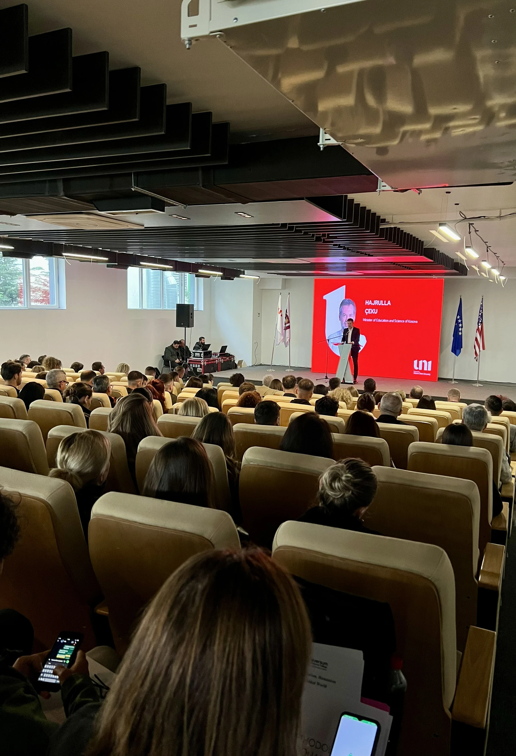 Audience attending a presentation at the 4th International Conference
